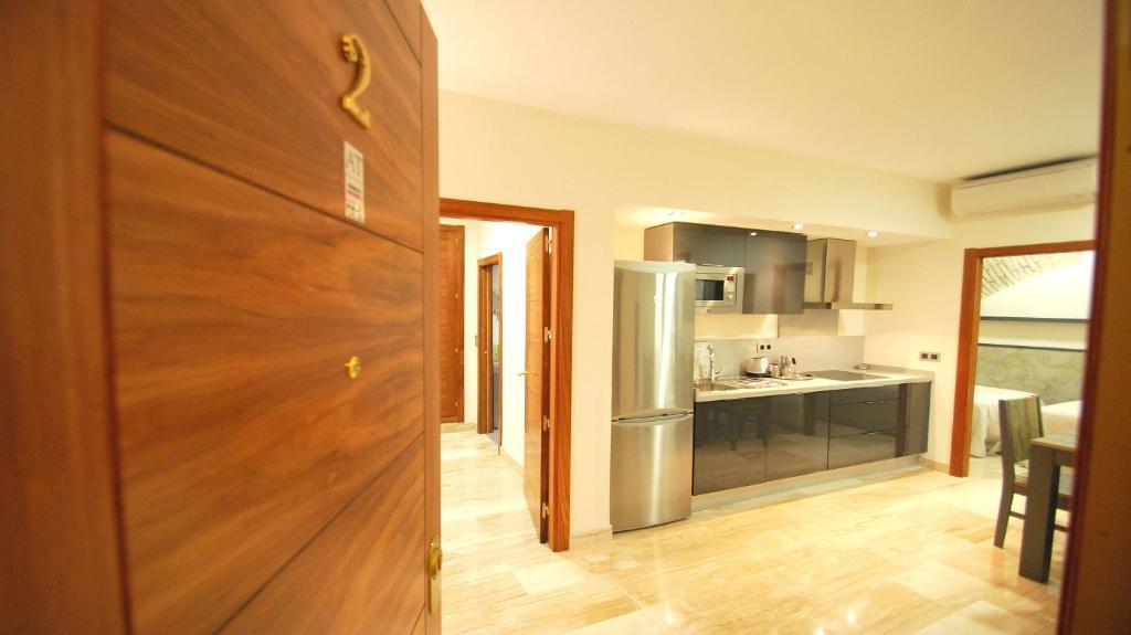 Apartamentos Living Sevilla Centro Maestranza Oda fotoğraf