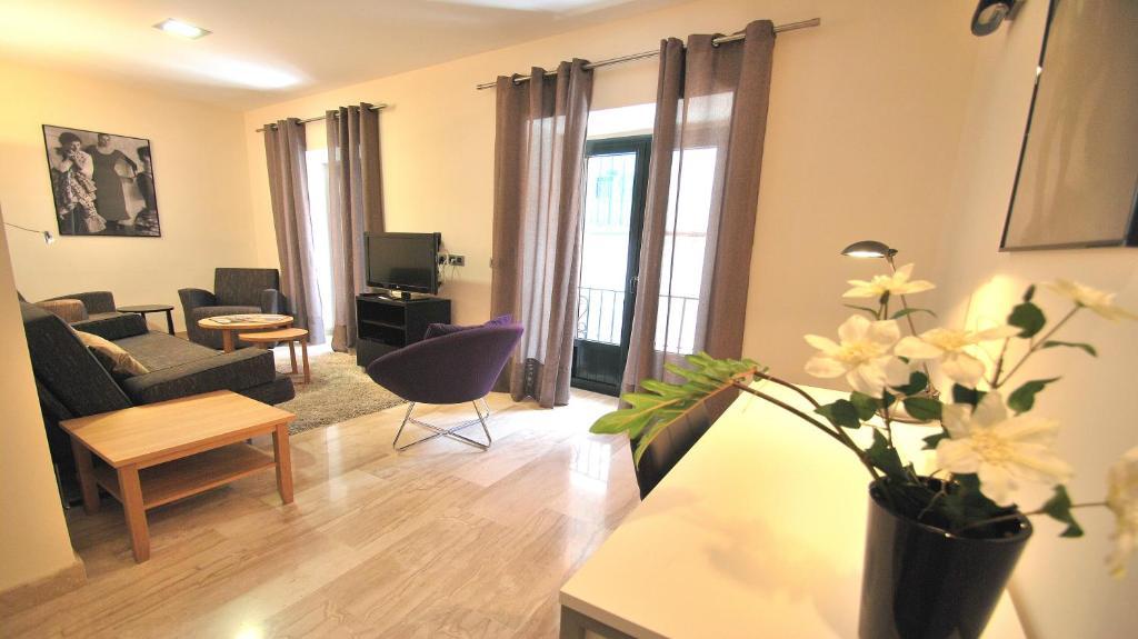 Apartamentos Living Sevilla Centro Maestranza Oda fotoğraf