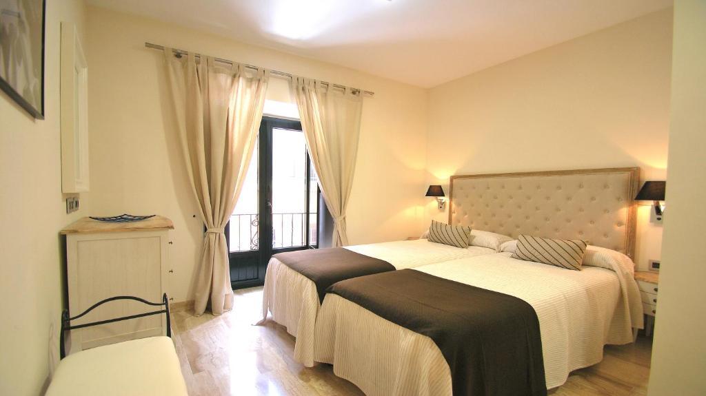 Apartamentos Living Sevilla Centro Maestranza Oda fotoğraf